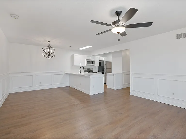 Immerse yourself in this elegantly designed kitchen and dining space, where modern meets comfort. Immerse yourself in this elegantly designed kitchen and dining space, where modern meets comfort.