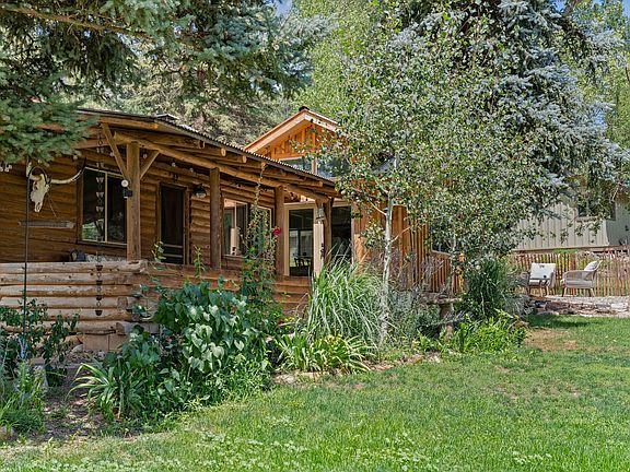 Covered back porch
Faces east with view of Missionary Ridge
Pine trees/aspen trees/tall grasses/flowers
Fenced side and back yard
