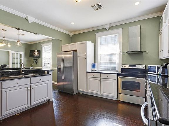 5th image of 6036-38 Louisville St