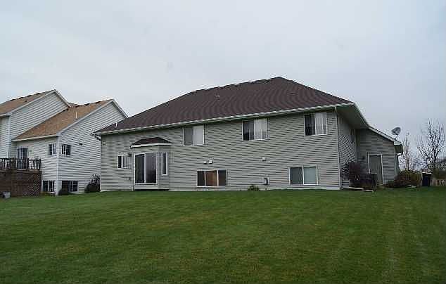 The backyard is very spacious for all the toys, patio equipment and more