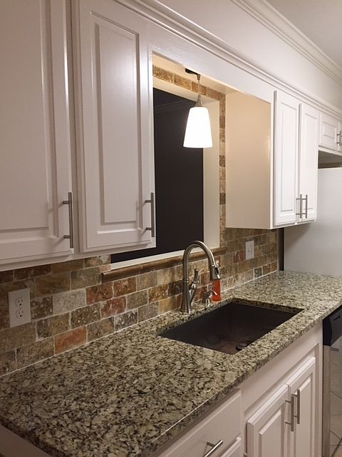 Kitchen with granite counter