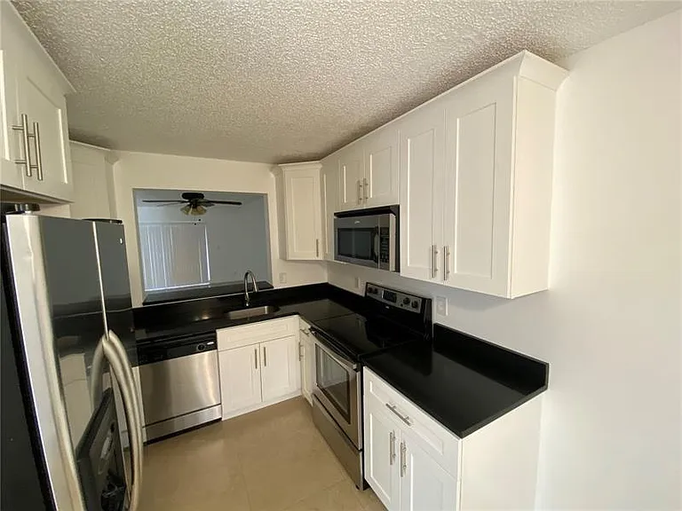 23466 SW 57th Ave #504 — Photo 4