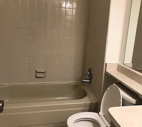 Nice size bathroom with linen storage