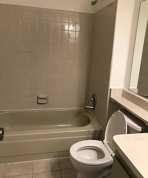 Nice size bathroom with linen storage