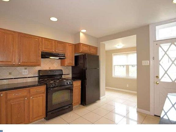 kitchen with breakfast room and access to rear yard