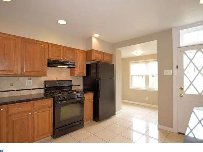 kitchen with breakfast room and access to rear yard
