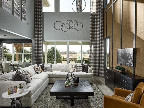 Two-story great room with lots of windows