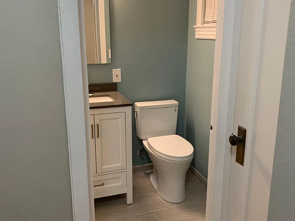 Bathroom- full size shower/tub, sink with vanity & medicine cabinet, fan/heater, and new floors- stunning!