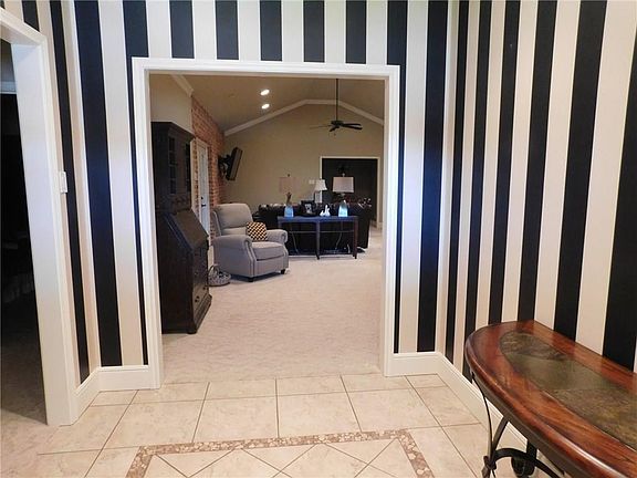 AS YOU WALK THROUGH THE FRONT DOOR, THIS IS THE WELCOME YOU RECEIVE.