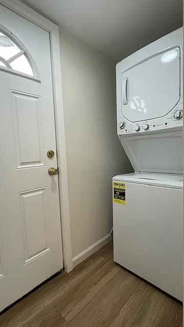 Laundry room with door to outside balcony