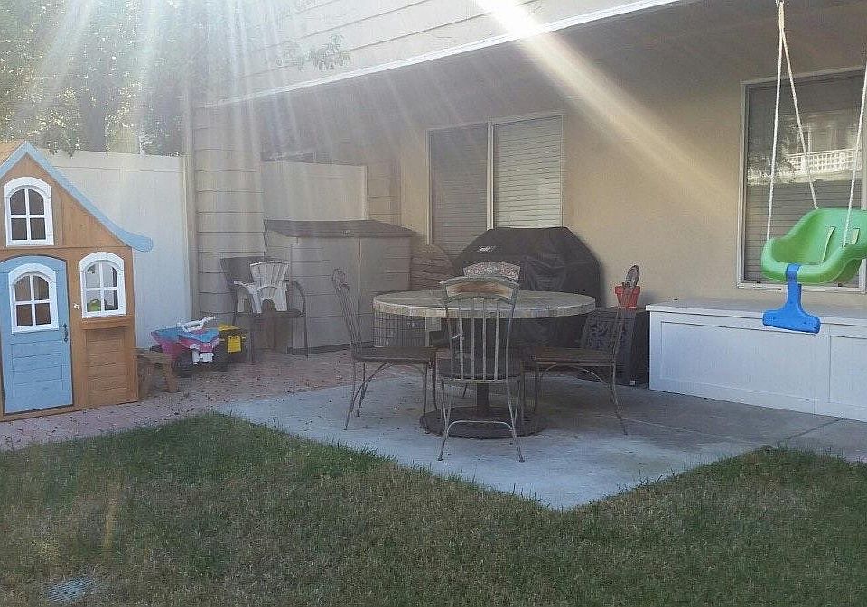 Spacious rear yard with covered loggia. Built-in storage be