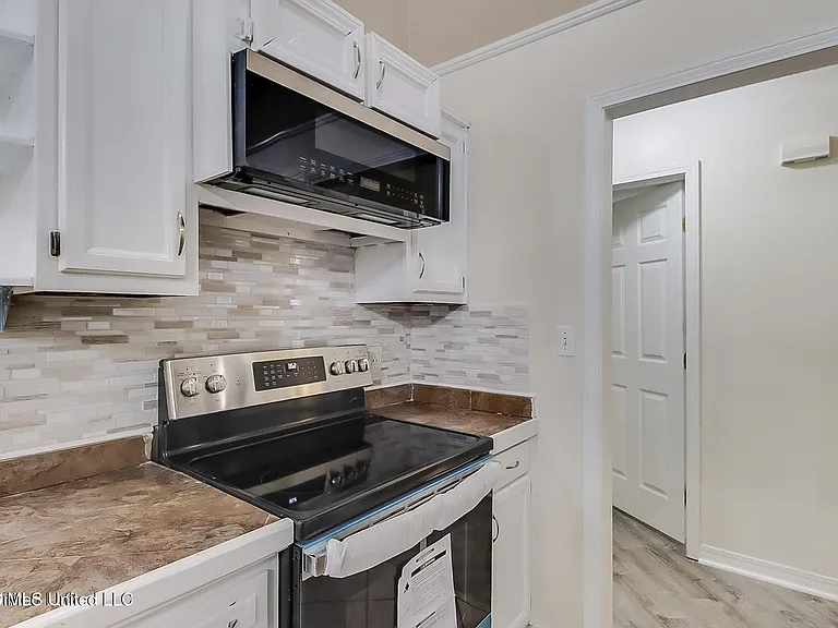 9228 Pointe Aux Chenes Rd — Photo 8
