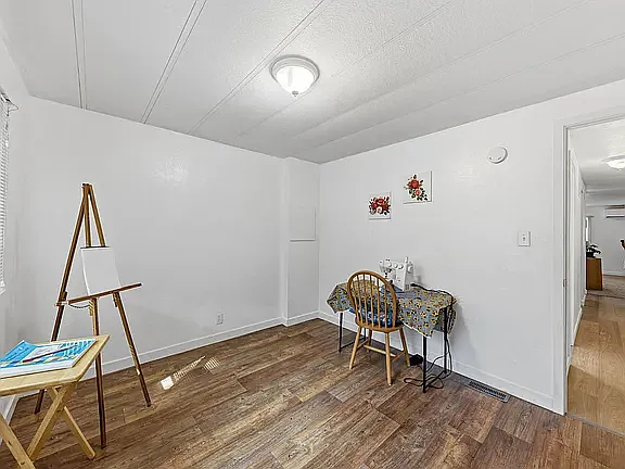 2nd Bedroom, or use as office, hobby room, exercise. Lots of indirect light.