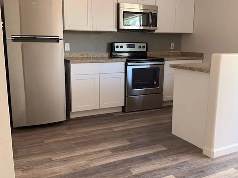 West Wood Village — Photo 1