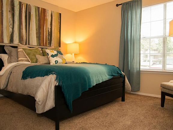 Spacious Bedrooms with plush carpet and large windows