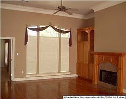 Living w/ Gas/Wood fireplace and built-in TV/Electronics Cabinet