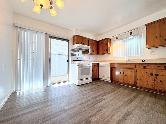 Kitchen with sliding door to private patio