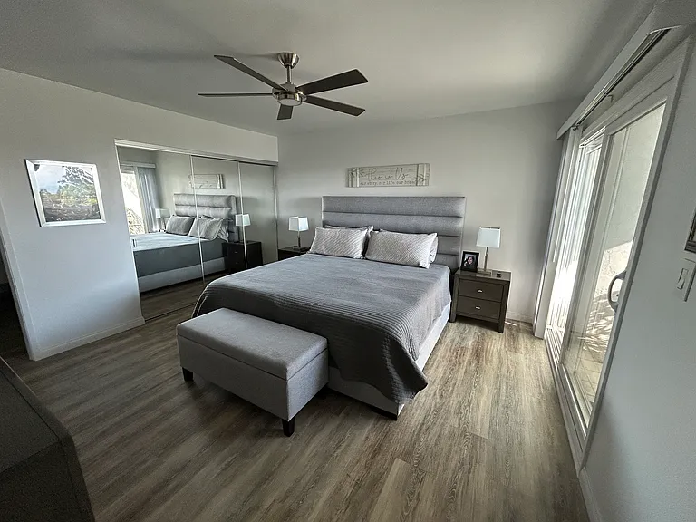 master bedroom king with patio