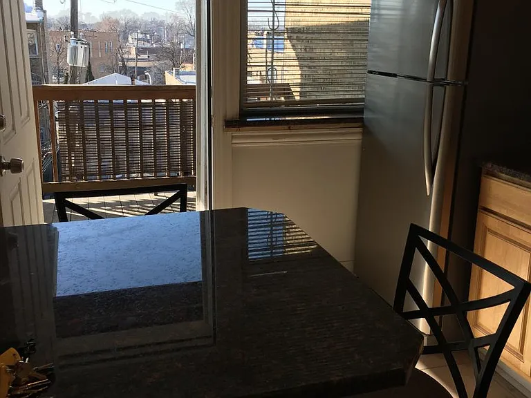 kitchen opens to outside deck area