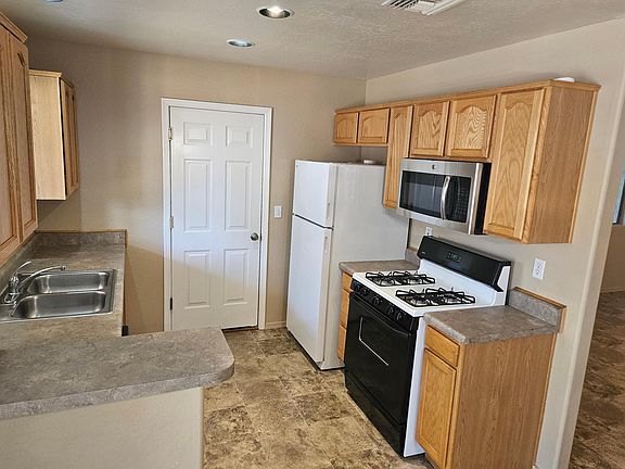 INTERIOR PHOTOS SHOWN ARE FROM UNIT #2 ASSUME MIRROR IMAGE AND SIMILAR CONDITION
