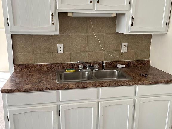 Plenty of cabinet space with drawers.