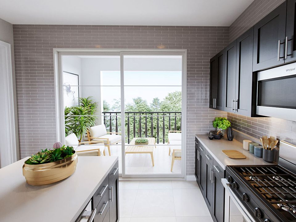 Violet At Canvas Plan 4 Model Home Kitchen And Deck