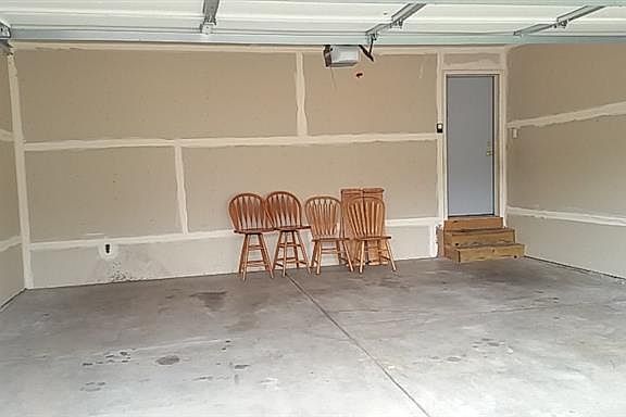 Insulated and sheetrocked two car garage.