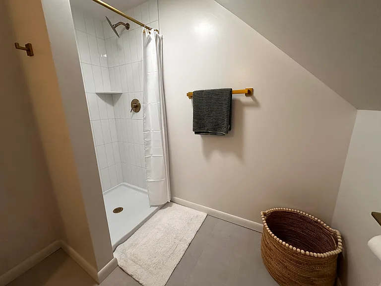 Upstairs bathroom with shower.