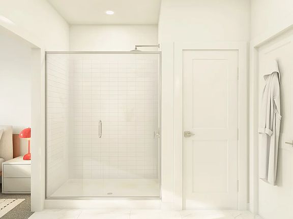 Primary bath with glass shower enclosure