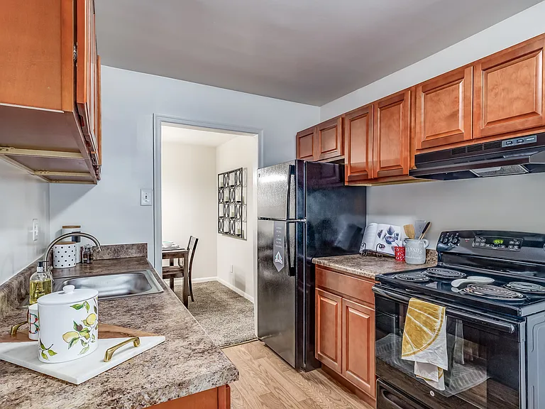 Step into this charming kitchen, where function meets warmth.