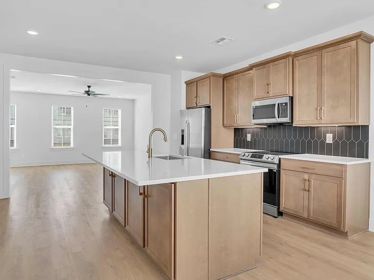 Spacious Kitchen with Modern Finishes and Island