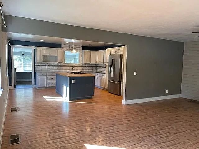 View from the front door to the kitchen and office.