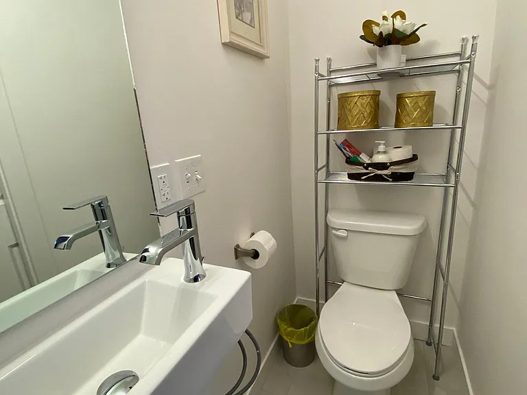 Bathroom #1: Full bathroom from first floor (shower, sink, and toilet)