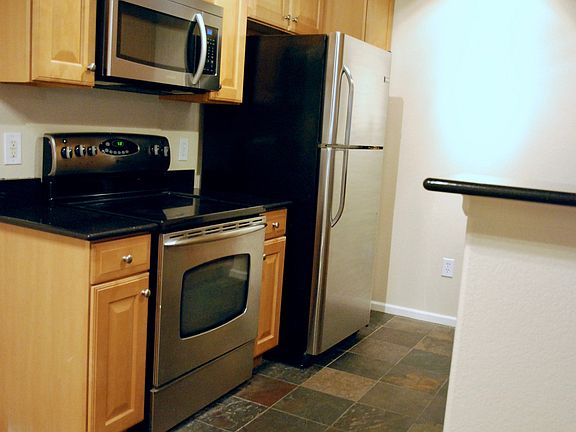 Kitchen - Granite countertops and slate flooring