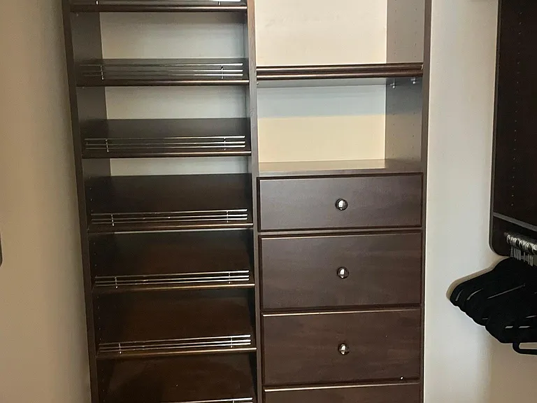 big walk in closet with plenty of storage space.