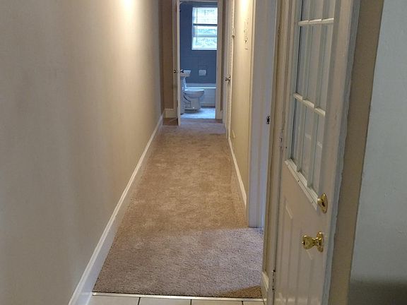 Hallway to full bath