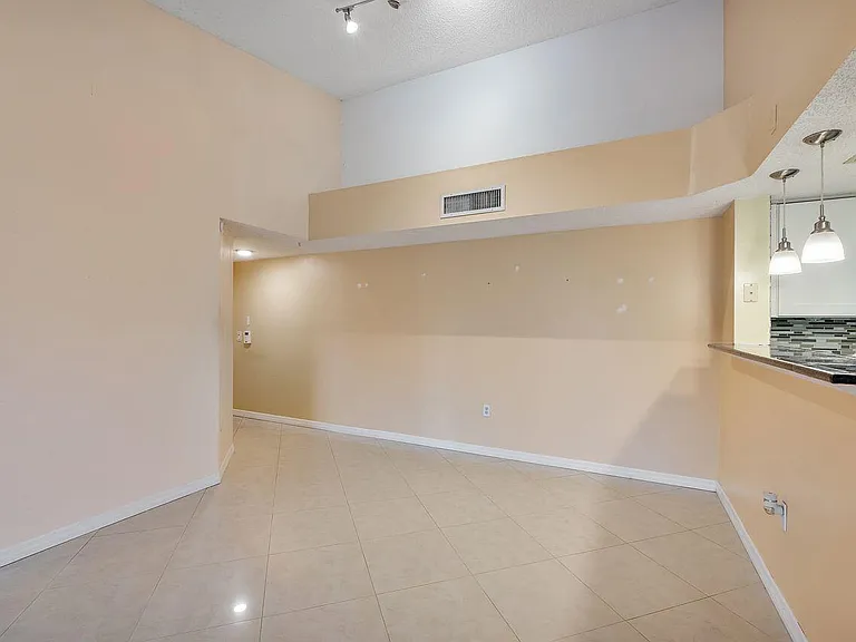 5011 Wiles Rd #303 — Photo 9