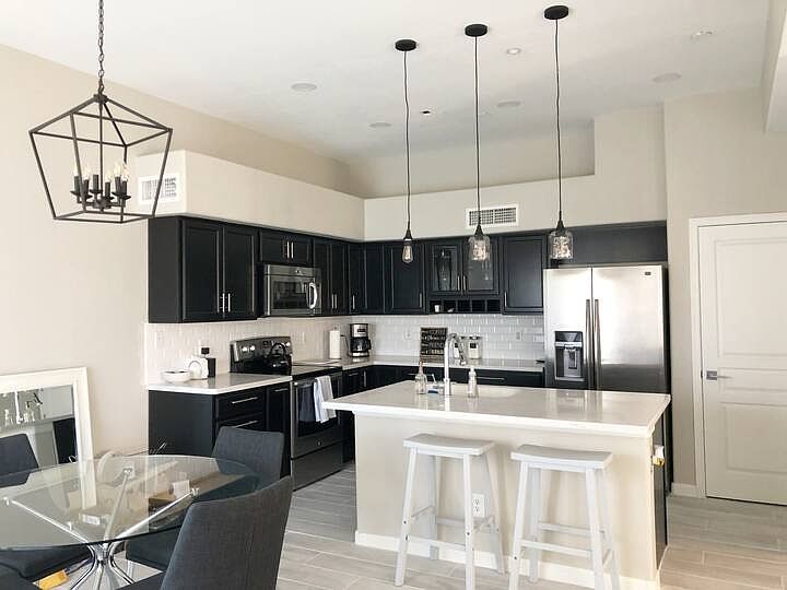 Kitchen, kitchen island and dining area