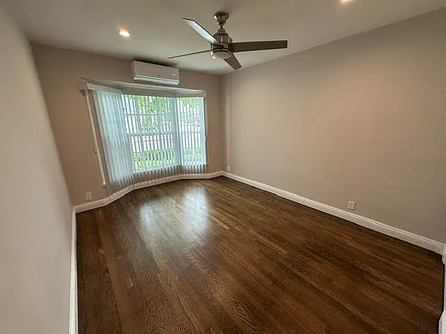 Bedroom (Newly redone hardwood floors). New blinds