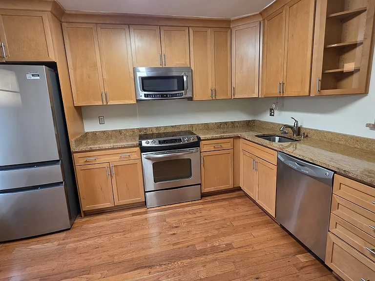 Beautiful Kitchen Features Wood Cabinets, Granite Countertops, Stainless Appliances, Large Pantry