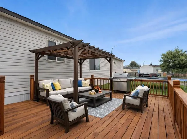 113 Heritage Dr, Okotoks, AB T1S 1M4