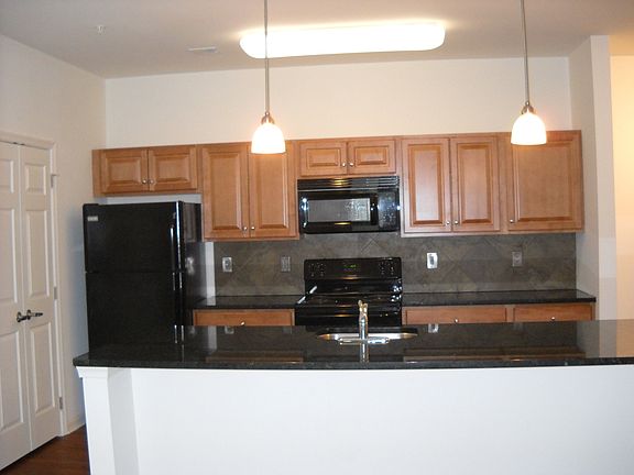 Kitchen with Granite Counters and Island