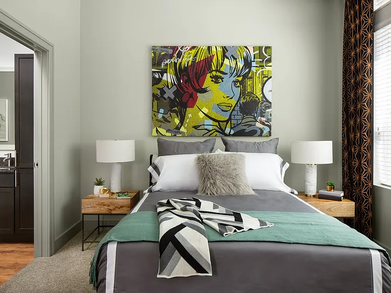 Spacious apartment bedroom with plush carpet flooring