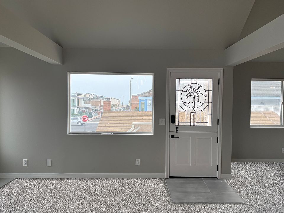 Dutch door with keypad lock & ocean view from living room.
