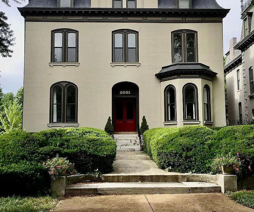 The mansion has been divided into four luxury condos.