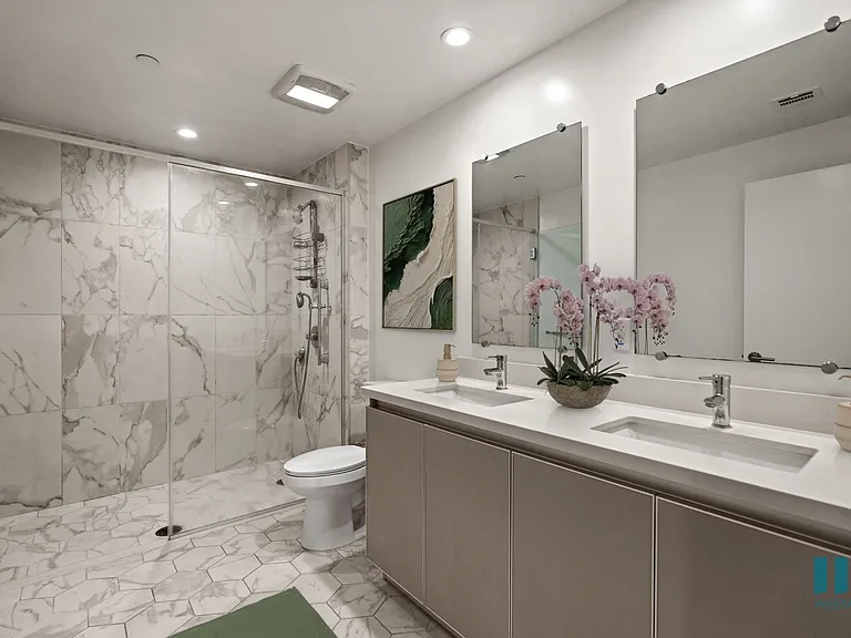 Bathroom with Walk-In Shower and Double-Sink Vanity with Cabinet Storage