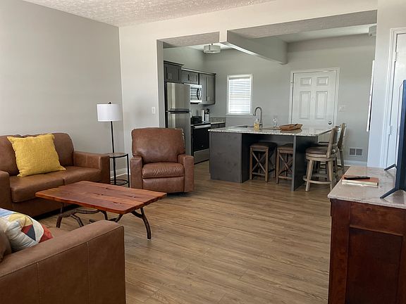 Spacious, open concept Dining/Living area with a beautiful granite Island that will seat up to 7!