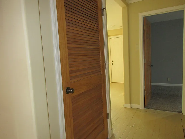 furnace and water softener behind door