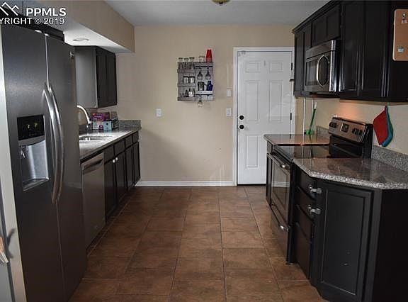Kitchen and entry to garage