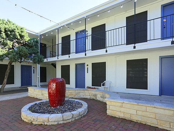 Soco at Alpine Outdoor Common area with fountain and Exterior building